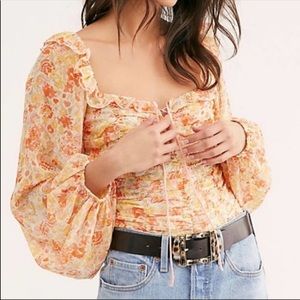 Super cute floral free people top! Size small